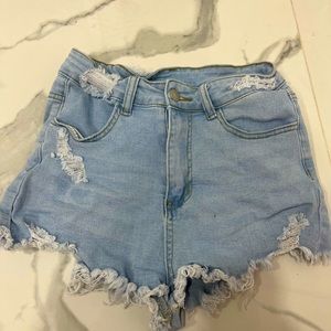 light blue ripped jean shorts, high stretched